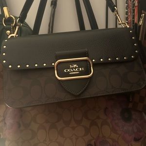 New without tags. Coach. Purchased. Never used.